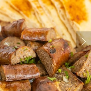 Loukaniko (Greek Pork Sausage) With Pita